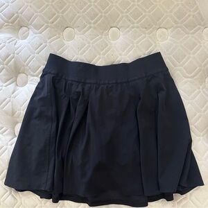 black pleated tennis skirt
